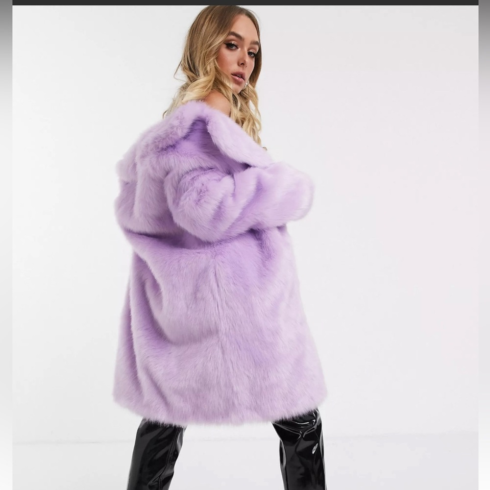 Purple faux fur coat. Cute to dress down or for a fun holiday party look.